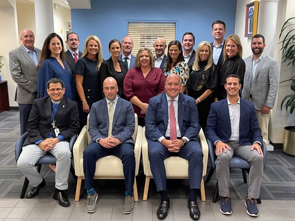 The Board of Trustees in a group photo.